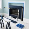 Freestanding electric fireplaces that fool guests into thinking they are built-in: the three design tricks